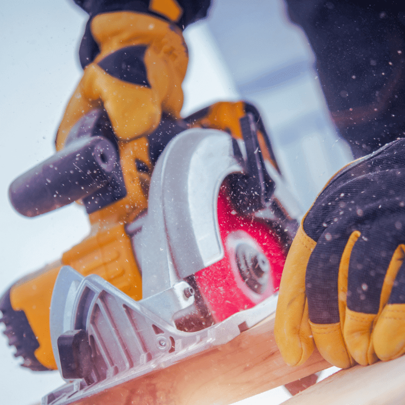 man using a saw